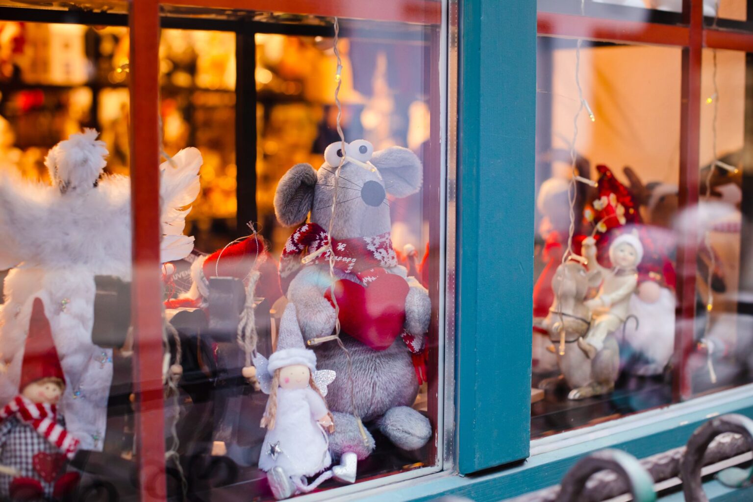 Festive toys and decorations in a Christmas shop window